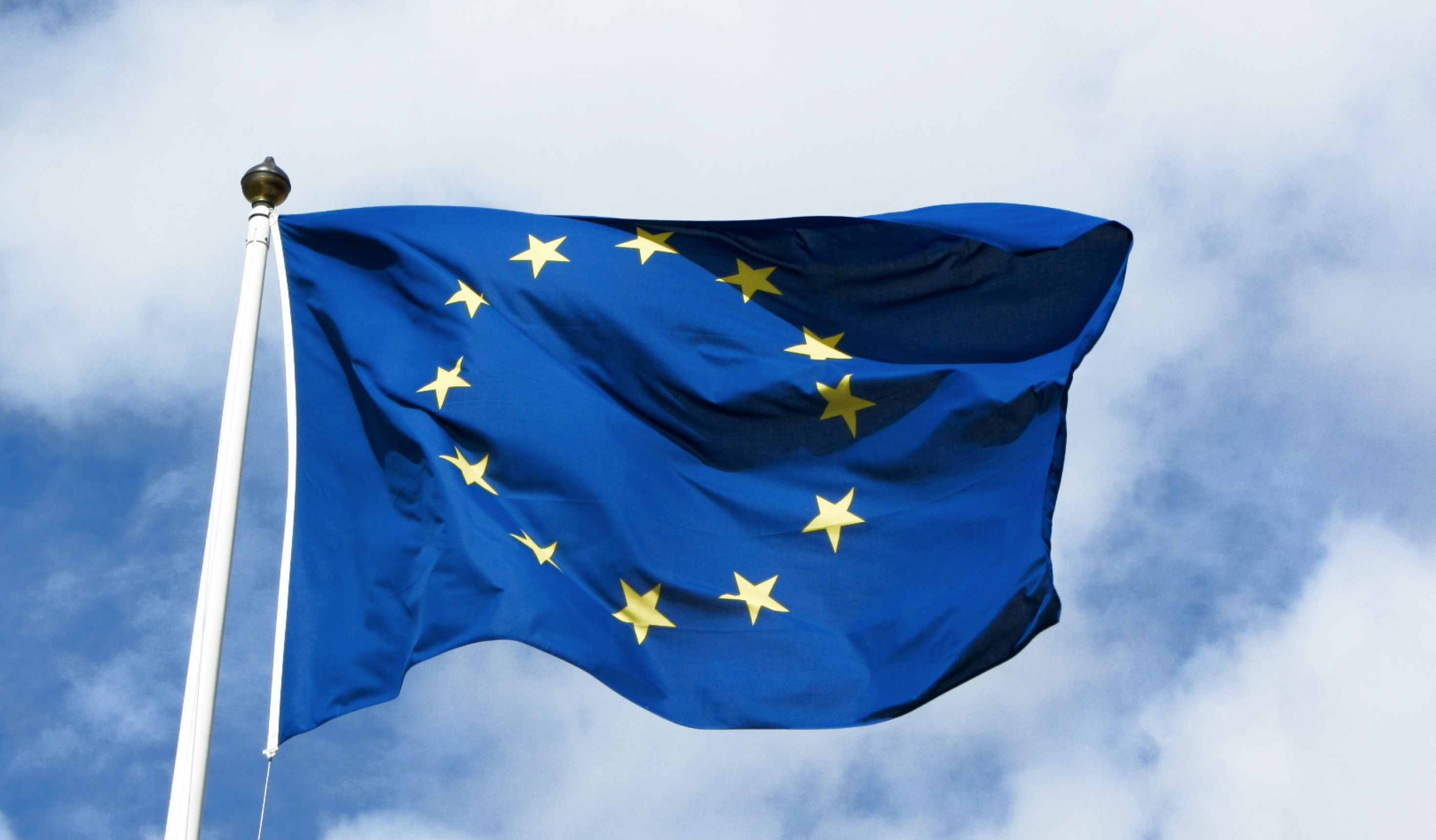 A picture of the EU flag blowing in the wind